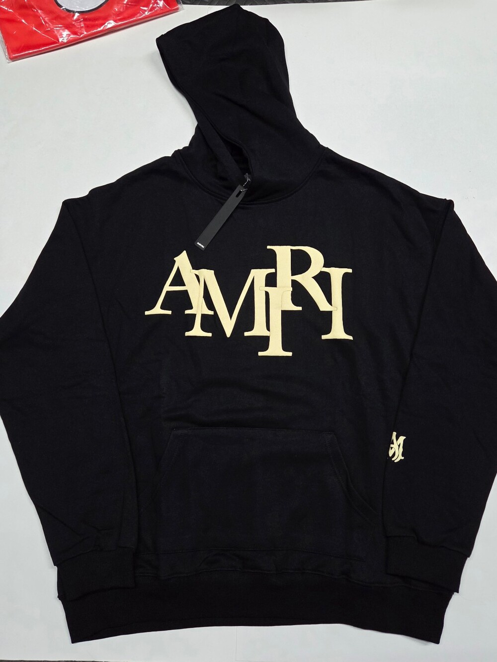AMIRI Black Hoodie with Cream AMIRI Logo Size M.